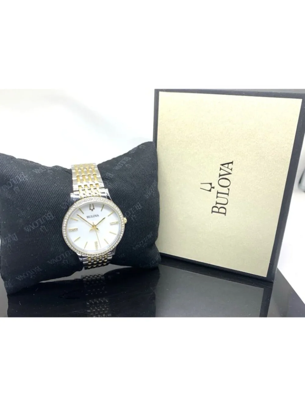 Bulova inches steel